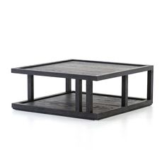 a square coffee table with two sections on each side