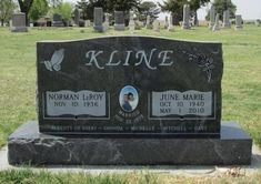 the headstones of two people are shown in this cemetery