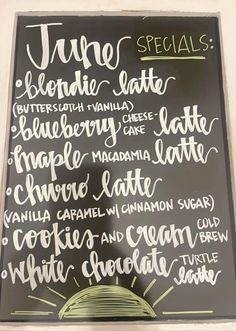 the menu for june's specials is displayed on a blackboard with white writing