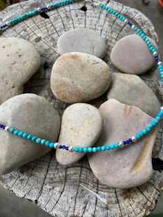 This colorful and dainty necklace is made of natural campitos turquoise and natural lapis with little sterling silver beads. It has a sterling silver lobster clasp and measures 18.75 inches in length. Dime pictured for size reference. Made with love in my little metal shop! Blue Sterling Silver Necklaces With Tiny Beads, Beaded Turquoise Necklace In Sterling Silver, Blue Beaded Turquoise Necklace In Sterling Silver, Turquoise Gemstone Beaded Necklaces In Sterling Silver, Blue Turquoise Necklace With Tiny Beads For Gift, Turquoise Gemstone Beads Necklace In Sterling Silver, Sterling Silver Beaded Blue Turquoise Necklace, Sterling Silver Beaded Turquoise Necklace, Blue Turquoise Necklace With Sterling Silver Round Beads