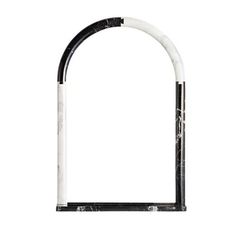 a black and white marble door handle with an arched design on the outside of it