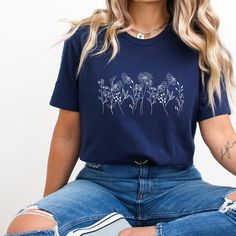 Minimalist Shirt,Flowers Crewneck Shirt,Wildflower Shirt,Aesthetic Tees,Wild Flowers Graphic Tees,Floral Shirt,Plant Lover Gifts,Trendy Tee 🌎 Welcome to SoftWardrobeGifts 🛍️🎁 Hello, welcome to our store. If you are looking for stylish, comfortable, aesthetic and quality products, you are at the right place. Our store works devotedly to make you and your loved ones happy. We made your shopping more enjoyable and fun. 🤩 You can send your favorite moments, photos of your family members, photos Trendy Crew Neck Tops With Plants Print, Trendy Crew Neck Shirt With Plant Print, Relaxed Fit Crew Neck Tops With Plant Print, Blue Relaxed Fit T-shirt With Plant Print, Blue Plant Print Crew Neck Top, Blue Crew Neck T-shirt With Plant Print, Blue Tops With Plants Print And Relaxed Fit, Aesthetic Tees, Plant Lover Gifts