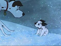 a dalmatian and a dog in the snow looking at each other's eyes