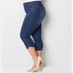 Featuring A Hidden Tummy Control Panel, No Gap Waistband And Premium Stretch Fabric, Our Flexi Fit Denim Technology Provides The Perfect Fit. This Plus Size Denim Capri Style Has Tons Of Interest With The Tulip Hem Details. Plus Size Capri. 5-Pocket. Button With Zip Fly. Cotton/Polyester/Rayon. Machine Wash. Imported. Approx. 23 Inch Inseam. Stretch Knee-length Cropped Denim Jeans, Medium Wash Knee-length Denim Capris, Denim Blue Knee-length Capris, Stretch Denim Short Length Capris, Stretch Denim Short-length Capris, Stretch Denim Short Capris, Stretch Medium Wash Capri Length Capris, Capri Style, Denim Capri