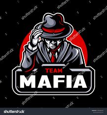 a man in a suit and hat holding his hands up to his head with the word team maffa on it