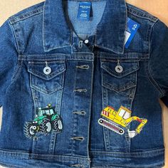 a denim jacket with patches on it