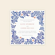 a blue and orange wedding card with an ornate border in the middle, on a white background