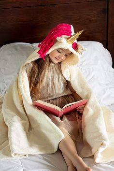 "🦄GREAT FOR GIFTS: little girls absolutely love our fuzzy wearable fleece unicorn blankets 🦄FUN DETAILS KIDS LOVE: pink yarn mane, cute flower, gold horn and sparkles, cuddly rose mink 🦄COMFY: incredibly soft fleece, plush minky fabric lining, and large hood feel amazingly snuggly 🦄WARM: extra thick, seriously cozy throw blanket your girl can completely wrap up in, size 66\"x42\" 🦄GUARANTEE: If you don't absolutely love this hooded blanket, we'll happily replace or refund it Cute Gift Gifts Blankets For Kids, Unicorn Blanket, Gold Horns, Unicorn Decorations, Cute Blankets, Cozy Throw Blanket, Pink Yarn, Cozy Throws, Blanket Wrap