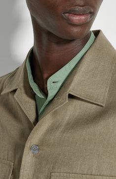 This all-linen overshirt can easily be called on for lightweight-jacket duty thanks to its twill fabrication, while roomy patch pockets add utility. Front button closure Spread collar Long sleeves with button cuffs Chest flap-patch pockets; side-seam pockets 100% linen Dry clean or machine wash, line dry Made in Italy Designer Clothing Unstructured Linen Button-up Outerwear, Casual Linen Outerwear With Buttoned Pockets, Spring Linen Utility Jacket With Flap Pockets, Button-up Linen Utility Jacket With Pockets, Linen Button-up Utility Jacket With Pockets, Khaki Linen Single-breasted Outerwear, Khaki Linen Outerwear With Pockets, Khaki Single Breasted Utility Shacket, Utility Unstructured Top With Patch Pockets