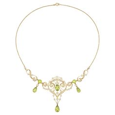 An Edwardian peridot and pearl necklace, to the centre an oval faceted peridot measuring 10x7mm millegrain-set to yellow gold collet, surrounded by gold openwork scroll-design frame embellished with small half pearls, and suspending a pear-shaped faceted peridot measuring 11.5 x 7mm, on each side connected with a peridot and pearl drop link, terminating to a figure-of-eight gold link set with half-pearls, mounted in 15ct gold, all suspended by a gold trace chain with bolt ring clasp, circa 1910, Fine Jewelry Peridot Necklace For Anniversary, Art Nouveau Jewelry Silver, Formal Peridot Gemstone Necklaces, Vintage Gold Peridot Jewelry, Peridot Necklace Vintage, Luxury Peridot Pendant Necklace, Whimsical Jewelry, Edwardian Jewelry, Peridot Necklace