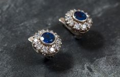 "Victorian Earrings set with a Created Sapphire in a flawless clarity & brilliant royal blue color in a 7mm (3 Carats for the pair), surrounded by high grade CZ Diamonds. Vintage Earrings design made of Solid 925 Sterling Silver ☞ made to last. Matching Ring: www.etsy.com/uk/listing/467023734 Matching Pendant: www.etsy.com/uk/listing/462931841 ⌛ Last pair left ⌛ For Pierced Ears - has a pin that goes into the ear and a leaver that securely closes on the pin behind the earlobes - \"English Lo Royal Blue Earrings, Earrings Sapphire, Victorian Earrings, Earrings Design, Matching Ring, Victorian Design, Victorian Rings, Royal Blue Color, Matching Rings