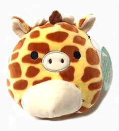 a giraffe stuffed animal with a tag on it's ear