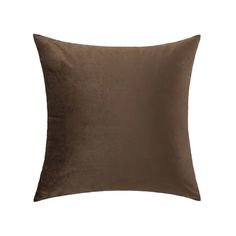 a brown pillow on a white background