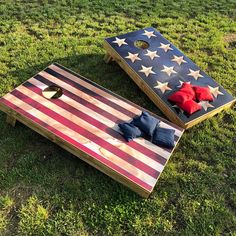 an american flag themed cornhole game in the grass