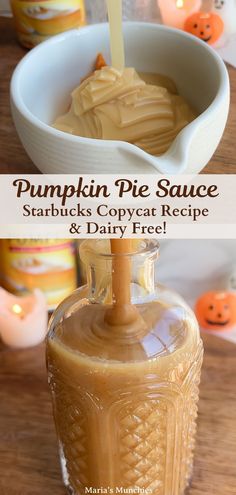 pumpkin pie sauce in a glass jar on top of a wooden table next to candles