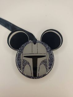 star wars mouse ears with the symbol for boba fett on it's head