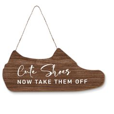 a wooden sign with the words cat shoes now take them off hanging from a rope