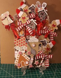 a clock made out of gingerbread cookies and candy canes