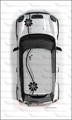 the top view of a white car with black flowers on it