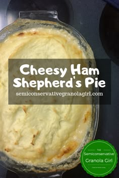 a cheesy ham shepherd's pie in a glass dish