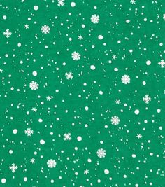 a green background with white snow flakes