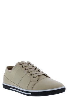 The lace-up Rory sneaker features a textile and manmade upper and cushioned insole for a sleek, comfortable look. Round cap toe Contrasting construction Lace-up style Cushioned insole Striped midsole Textile and manmade upper and lining, manmade sole Imported Lace-up Synthetic Canvas Shoes With Laces, Lace-up Synthetic Canvas Shoes, Synthetic Lace-up Canvas Shoes With Laces, Synthetic Lace-up Canvas Shoes, Synthetic Canvas Lace-up Shoes, Comfortable Synthetic Canvas Shoes With Laces, Lace-up Synthetic Canvas Shoes With Cushioned Footbed, Lace-up Canvas Shoes With Cushioned Footbed, Low-top Synthetic Canvas Shoes With Cushioned Footbed