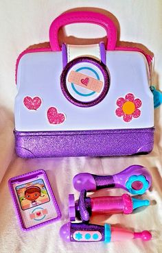 Disney Jr Doc Mcstuffins Doctor Kit with 5 Accessories White Purple Sparkles Doctor Stuff, Disney Doc Mcstuffins, Children's Games, Disney Jr, Doc Mcstuffins, Purple Sparkle, Childrens Games, Disney Junior, Christmas Toys