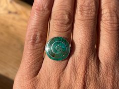 THIS RING IS ADJUSTABLE ! This beautiful pachamama (mother earth) ring is made by hand by the beautiful Quechua people of the Peruvian Andes. It is made by 950 silver and Chrysocolla Stone Weight : 4.8 gr Width : 1.7 cm It is handmade in 950 silver with inlaid stone and shell by a local family of jewelry artisans. Earth Ring, Multi Stone Ring, Multi Stone, Mother Earth, Stone Rings, Peru, Rings For Men, Silver Rings, Stone