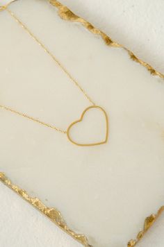 Chain necklace with gold heart-shaped pendant. 


All our jewelry is made of surgical stainless steel



 It is anti-allergic


 Durable



 Waterproof Hypoallergenic Heart Shaped Stainless Steel Necklace, Gold Stainless Steel Heart Necklace For Everyday, Everyday Gold Heart Necklace In Stainless Steel, Stainless Steel Heart Necklace For Everyday, Everyday Gold Stainless Steel Heart Necklace, Hypoallergenic Gold Heart Necklace, Heart-shaped Stainless Steel Necklace With Delicate Chain, Minimalist Heart Shape Stainless Steel Charm Necklace, Stainless Steel Heart Necklace With Delicate Chain