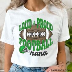 Get ready to cheer on your favorite team in style with our Loud and Proud Football Mama Tee! Made with high-quality sublimation printing, this shirt boasts vibrant colors and long-lasting durability. Show off your team spirit and let your voice be heard with this eye-catching and comfortable tee. Perfect for game days or any football-themed occasion, this shirt is a must-have for all passionate football mamas out there! The blend is a 65% polyester and cotton. Sometimes I may have to substitute other brands if I am sold out of the color. *How to order: *Select Size *Select Color *The design is done with sublimation. Sublimation is a process where ink is dyed onto the shirt using a commercial grade heat press. I use a special printer that has special ink specifically designed to get a long White Cheerleading Tops With Team Logo, White Tops With Team Logo For Cheerleading, Crew Neck Top With Team Logo For Cheerleading, Green Tops With Team Logo For Fan Gear, Green Top With Team Logo For Fan Gear, Green T-shirt With Team Name For Fans, Green T-shirt With Sublimation Print For Football Season, Green Sports Season T-shirt For Fan Gear, White T-shirt For Cheerleading, Sports Season