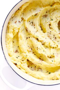 mashed potatoes in a white bowl with the words, the best mashed potatoes