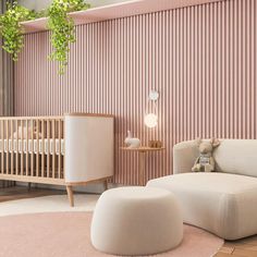 a baby's room with pink walls and furniture