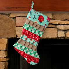 a christmas stocking hanging from a fireplace