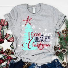 a t - shirt that says have a very beachy christmas