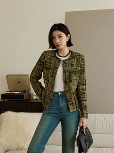 This exquisite handmade tweed bouclé jacket in multi-green hues is a true statement piece for any wardrobe. Crafted with meticulous attention to detail, this jacket exudes elegance and sophistication. The intricate bouclé fabric adds texture and depth to the design, creating a visually appealing look that is both timeless and chic. The combination of various shades of green gives the jacket a rich and luxurious appearance, perfect for adding a pop of color to any outfit. Accentuating the jacket Luxury Zara Tweed Outerwear, Tweed Boucle Jacket Outfit, Green Long Sleeve Tweed Jacket For Winter, Fitted Green Tweed Jacket For Winter, Green Tweed Jacket For Winter, Green Tweed Jacket For Winter Workwear, Green Tweed Outerwear For Fall, Green Single-breasted Tweed Jacket For Fall, Green Tweed Jacket For Workwear In Winter