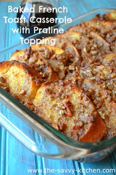 baked french toast casserole with pralie topping in a glass baking dish