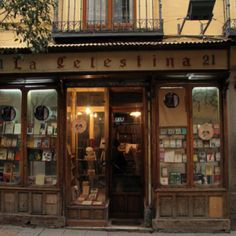 a store front with many books on display