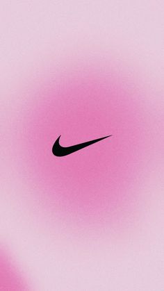 a black nike logo on a pink background