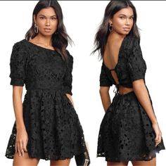 Nwt Lulus For A Moment Black Lace Cutout Mini Skater Dress L. Intricate Floral Crochet Lace, Atop A Knit Lining, Shapes A Bateau Neckline And Short, Puff Sleeves With Fitted Cuffs. A Darted Bodice Sits Above A Fitted Waist And Falls To A Flirty Mini Skater Skirt. Turn Around To Reveal A Cute Cutout Back With Adjustable Drawstring Details At The Waist And Back. Fully Lined. Self: 100% Polyester. Lining: 100% Rayon. Hand Wash Cold. Imported. Black Hollow Out Backless Dress, Black Hollow Out Dress For Going Out, Black Hollow Out Dress For Date Night, Ruffle Bodycon Dress, Red Skater Dress, Mini Skater Skirt, Lulus Dresses, Floral Cocktail Dress, Sequin Bodycon Dress