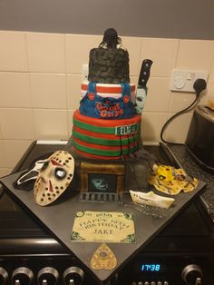 a cake made to look like a hockey goalie's mask and other items