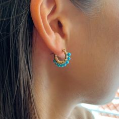 Hoop Earrings with Turquoise It is hand-crafted by me to order in Los Angeles  Thank you for shopping U & Mi :)  ✶MEASUREMENTS✶ -Earrings  0.7 inch  ✶MATERIALS✶ -14k gold filled findings  -Turquoise ✶GIVING AS A GIFT?✶ Jewelry will be packaged in a box and mailed in bubble mailer. If you would like to pick special label, please let me know! I offer three options:  1. Happy Birthday 2. Love 3. Best Friend ✶PROCESSING TIME✶ -Current processing time is 1-3 days. -Processing time is separate from shipping time. ✶SHIPPING✶ Free Shipping within the United States  General shipping time guidelines for USPS services -USPS First Class Package Services: 2-5 days -USPS Priority Mail: 1-3 days -USPS Priority Mail Express: 1-2 days ✶INTERNATIONAL SHIPPING✶ -May take 1 - 5weeks for your package to be del Turquoise Gemstone Hoop Earrings, Turquoise Hoop Earrings With Natural Stones As Gift, Turquoise Hoop Earrings As A Gift, Turquoise Hoop Earrings For Gift, Turquoise Natural Stone Hoop Earrings As Gift, Turquoise Dangle Hoop Earrings For Gift, Handmade Blue Huggie Earrings, Handmade Turquoise Hoop Earrings As Gift, Small Hoop Earrings With Natural Stones For Gift