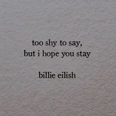 a quote written on the wall that says, too shy to say, but i hope you stay