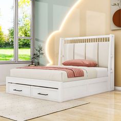 a white bed sitting in a bedroom on top of a hard wood floor next to a window