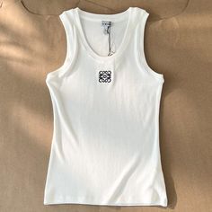 Loewe women's embroidered tank top Loewe Tank Top Outfit, Loewe Clothes, Loewe Tank Top, Loewe Outfit, Designer Wishlist, Loewe Top, Summer Wishlist, 2020 Style, Loewe Anagram