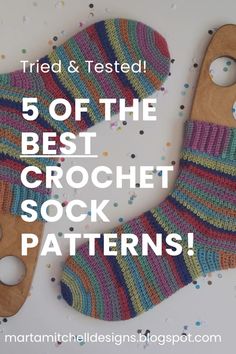 a pair of colorful socks sitting on top of a wooden board with text overlay that reads, tried & tested 50 of the best crochet sock patterns