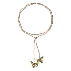 A soft yet striking style, the Flora Wrap Necklace blends natural elements of subtle olivine hand-painted enamel petals and sculptural floral inspired pendant pieces that hang from a long wrap around silhouette. Sculpted in our signature antique brass with brown cord woven through it's chain, this is the perfect necklace for layering. Antique Brass Hand Painted Enamel Details Wrap Style Necklace Necklace approximately measures 50 inches Adjustable in Length, Meant to be wrapped Floral components Element Necklace, Crown Necklace, Wrap Necklace, Wrap Necklaces, Crystal Crown, Natural Elements, Style Necklace, Diamond Crystal, Signet Ring