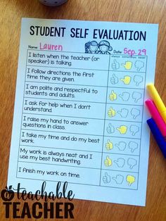 a student's self evaluation worksheet with colored pencils on the table