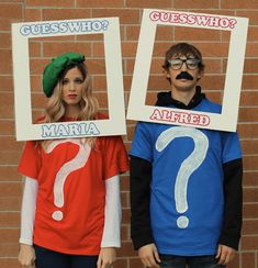 two people wearing costumes with question marks on them