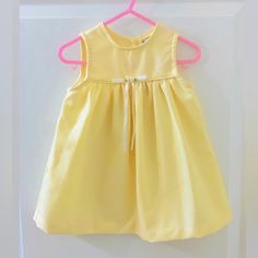 Yellow Sleeveless Dress Bow Decor Buttons On The Back Dress Has Been Stored For More Then A Decade Excellent Condition Like Brand New All Cloth Has Been Pre-Washed Cute Sleeveless Playwear Dress, Sleeveless Dresses For Spring Playtime, Yellow Sleeveless Dress For Playtime, Girls Yellow Dress, Dress Bow, Vintage Baby Girl, Bow Decor