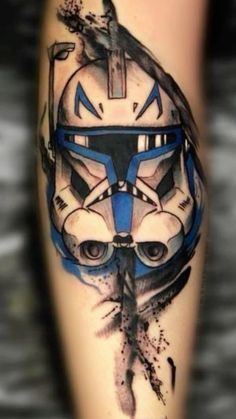 a star wars tattoo with a helmet on it